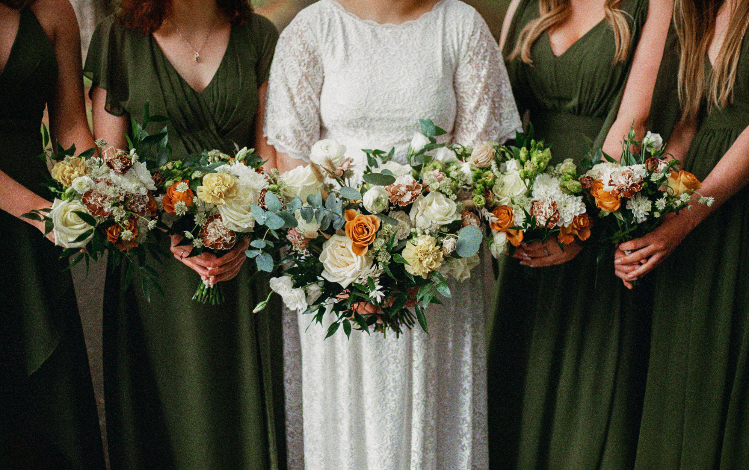 closeup of bridesmaids bouquets